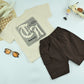 Boys Cream Graphic T-Shirt with Brown Cargo Shorts – 2-Piece Set